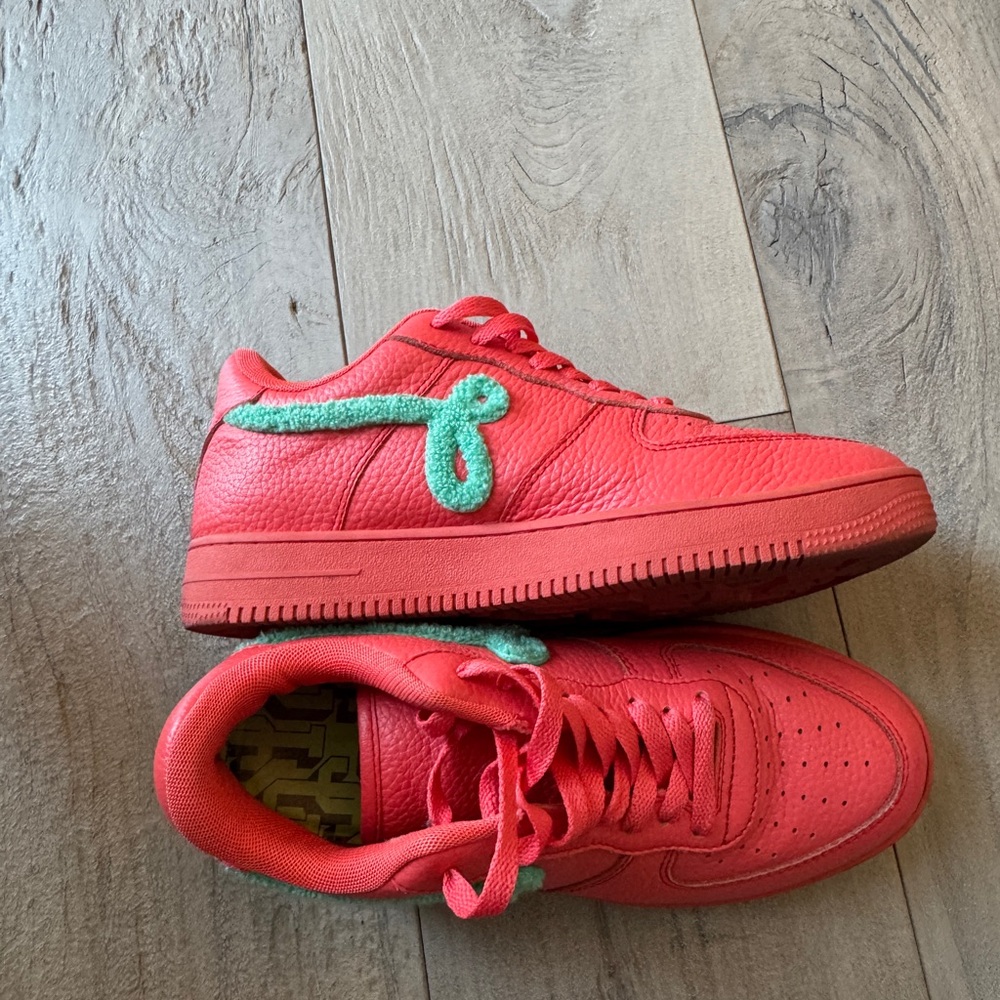 Red Sneakers with Turquoise Accent